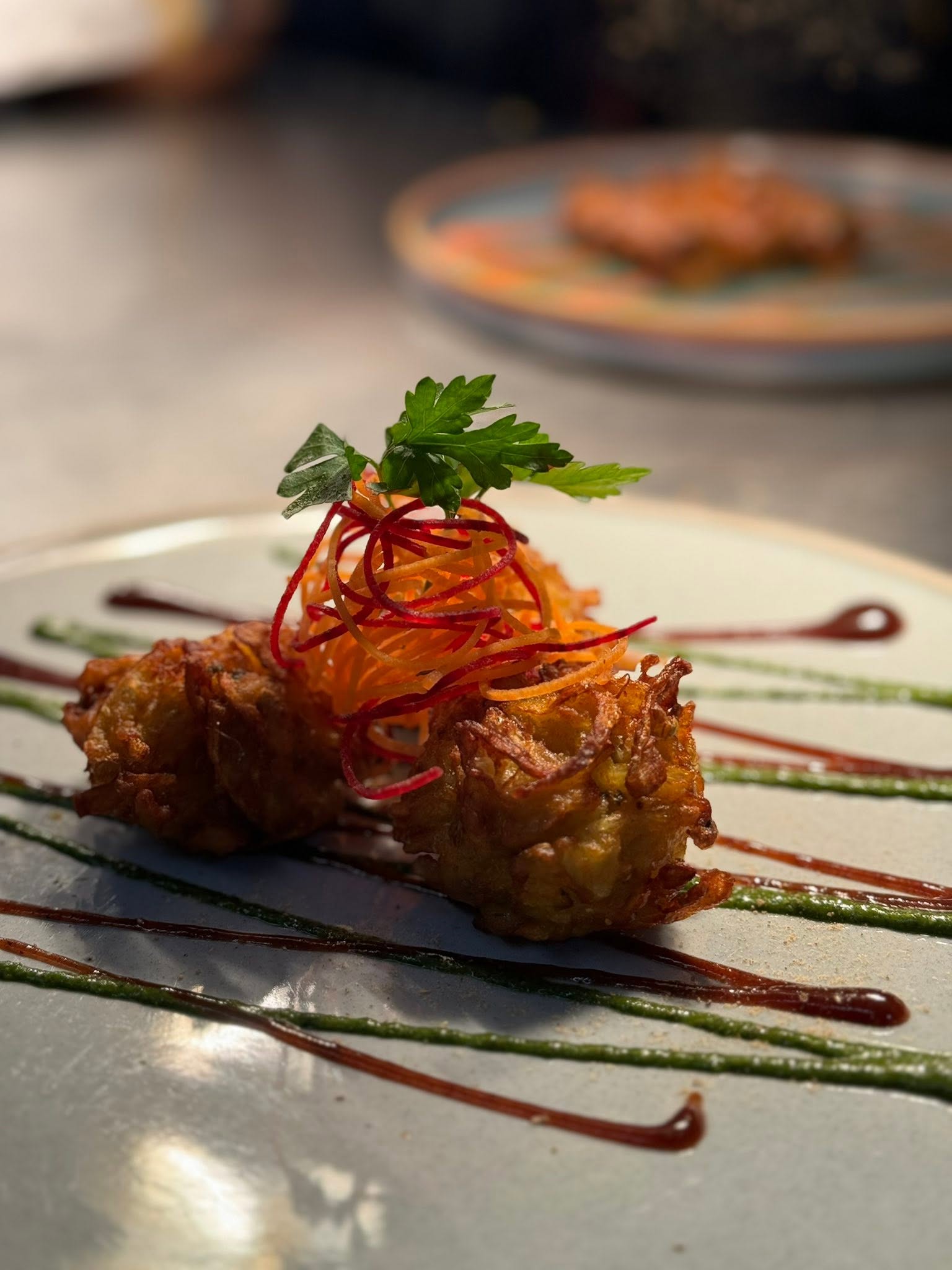 Crisp Nepalese appetiser with fresh garnish